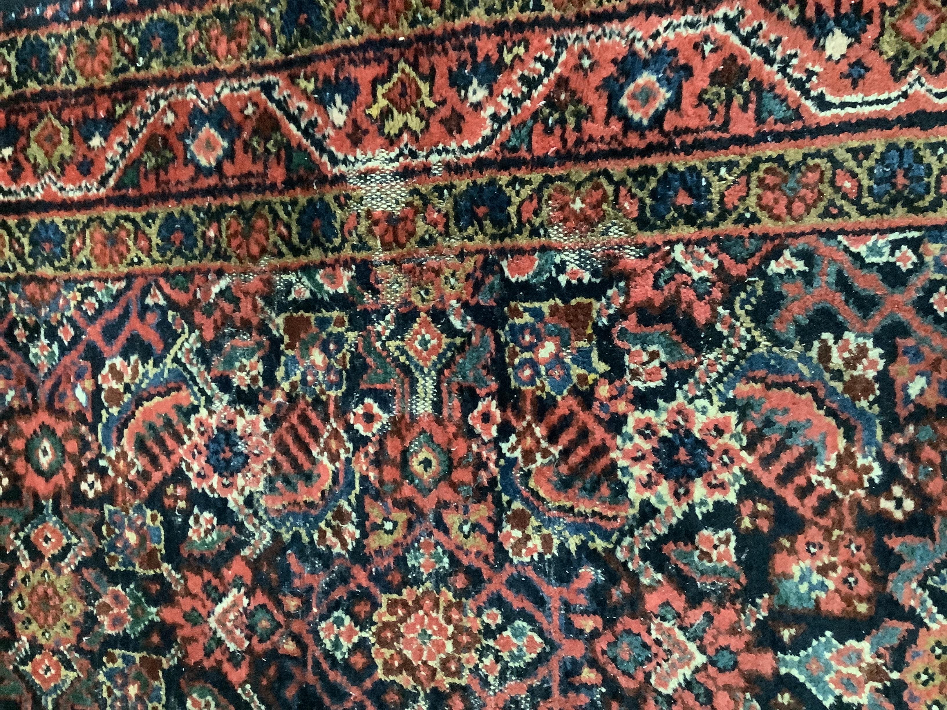 A North West Persian blue ground runner, 450 x 110cm